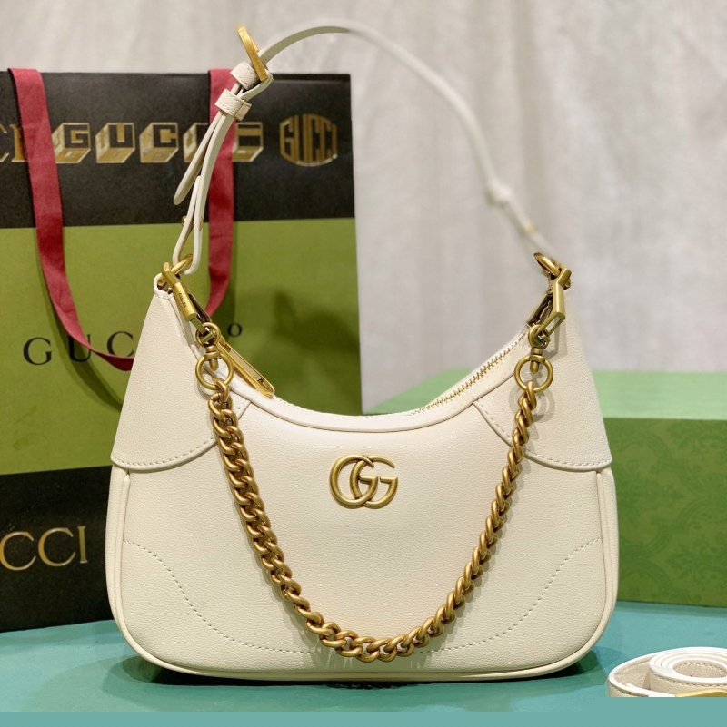 G*u*i top handle bags